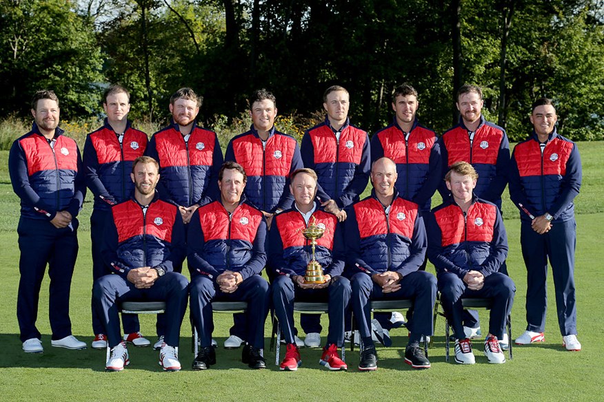 Dustin Johnson, Phil Mickelson, captain Davis Love III, Matt Kuchar, Brandt Snedeker, (back L-R) Ryan Moore, Zach Johnson, J.B. Holmes, Patrick Reed, Jordan Spieth, Brooks Koepka, Jimmy Walker and Rickie Fowler pose during team photocalls prior to the 2016 Ryder Cup at Hazeltine National Golf Club