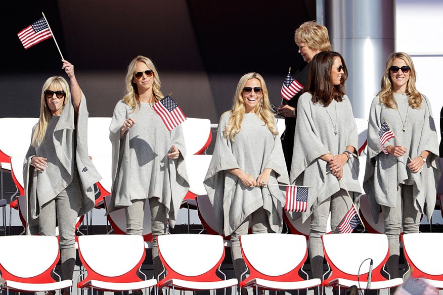  Justine Reed, Nichole Moore, Amy Mickelson, Sybi Kuchar and Becky Edwards wave flags during the 2016 Ryder Cup Opening Ceremony at Hazeltine