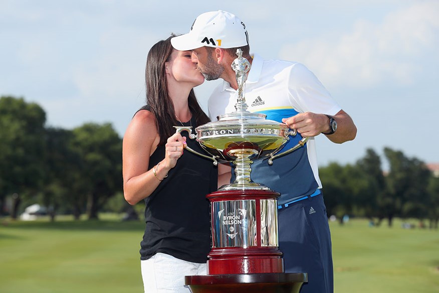  Sergio Garcia of Spain and Angela Akins pose with the trophy after winning the AT&T Byron Nelson