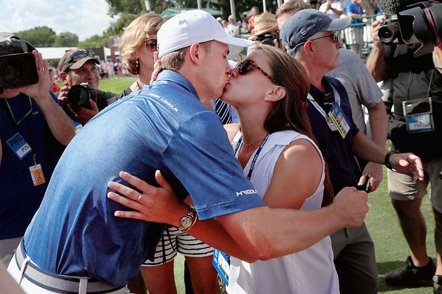 Jordan Spieth kisses his girlfriend, Annie Verret, after winning the DEAN & DELUCA Invitational