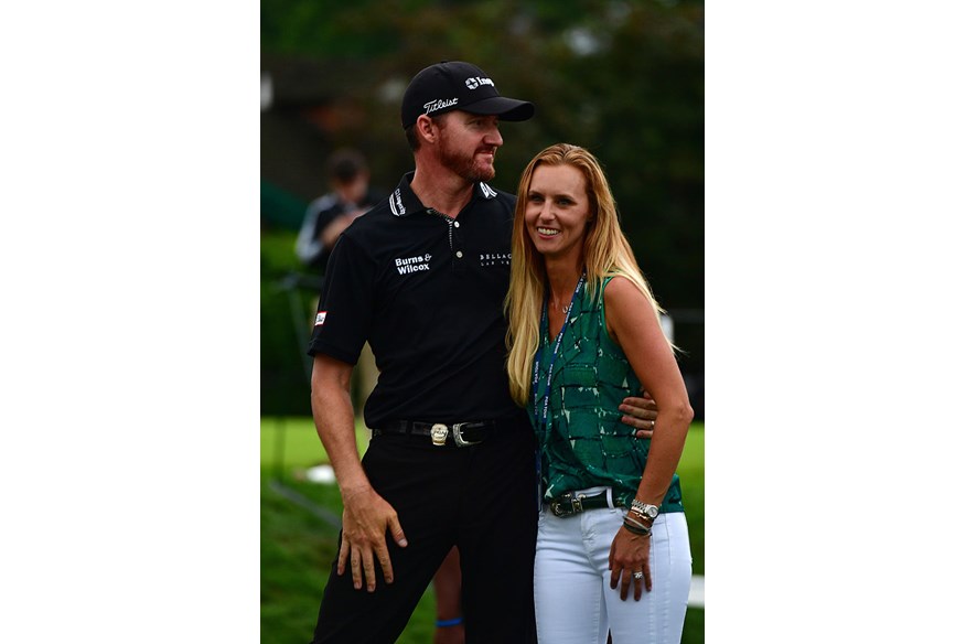 Jimmy Walker of the United States celebrates with his wife Erin after winning the 2016 PGA Championship at Baltusrol