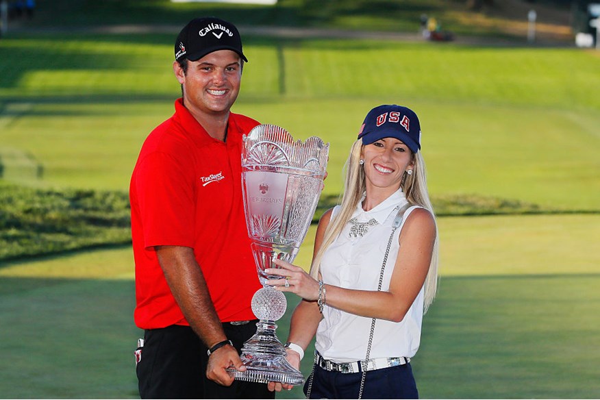  Patrick Reed poses with his wife Justine and the trophy after winning The Barclays in the PGA Tour FedExCup Play-Offs