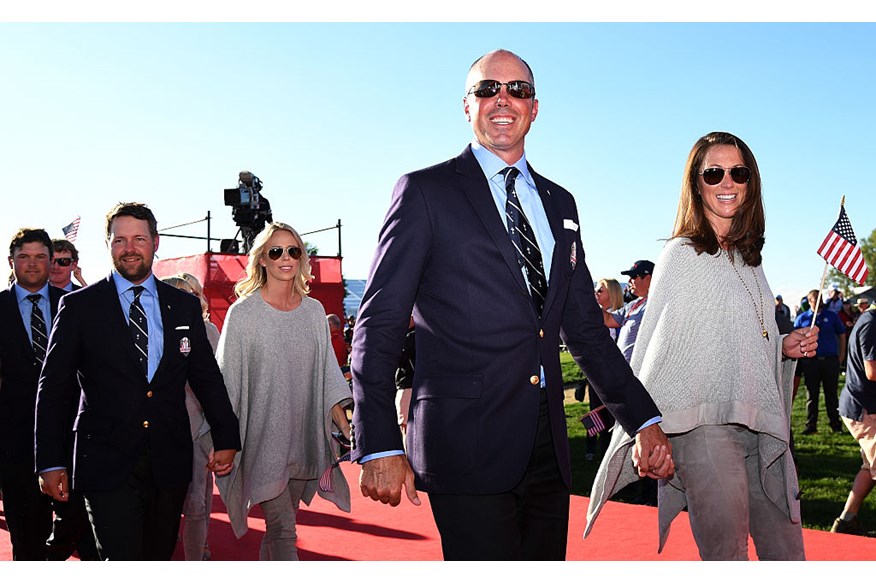 Matt Kuchar of the United States and Sybi Kuchar dpeart the 2016 Ryder Cup Opening Ceremony at Hazeltine National 