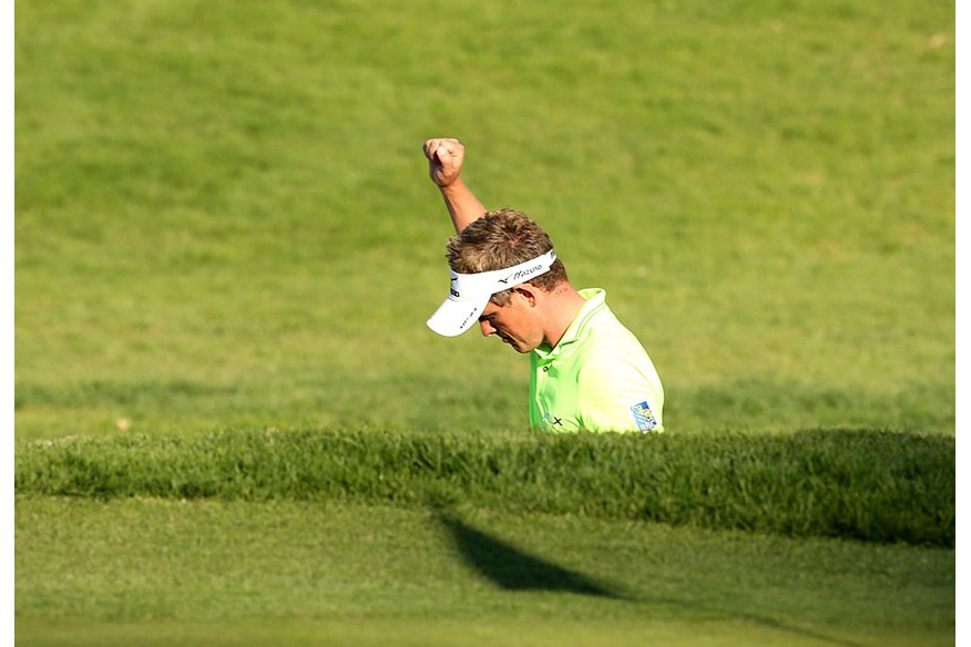 Luke Donald after holing out from a bunker for a birdie two on the 14th hole during the first round of the Northern Trust Open at Riviera Country Club. 