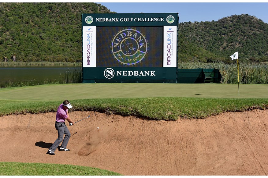 Luke Donald  plays from a greenside bunker on the 17th during the second round of the Nedbank Golf Challenge at the Gary Player Country Club.