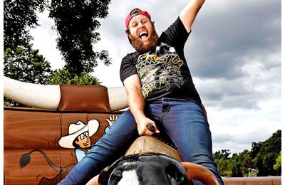 Andrew Beef Johnston rides a bull for TG