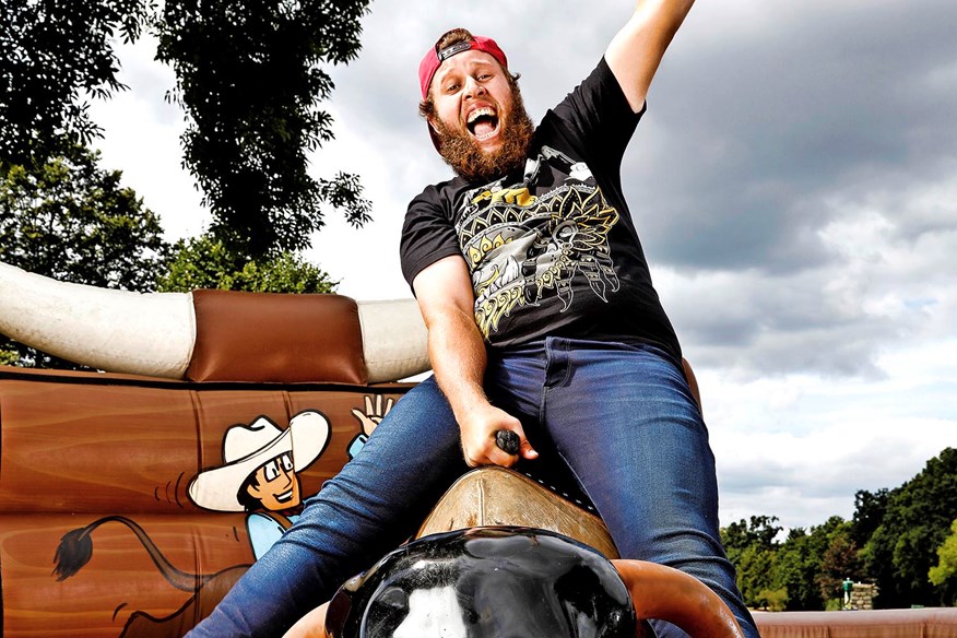 Andrew Beef Johnston rides a bull for TG