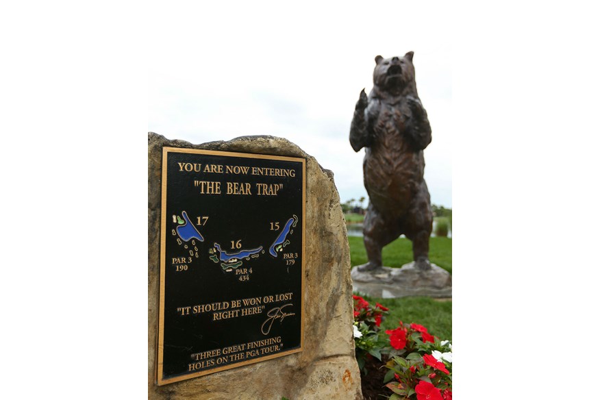 The Bear Trap is marked with a giant bear statue and plaque on the 15th hole