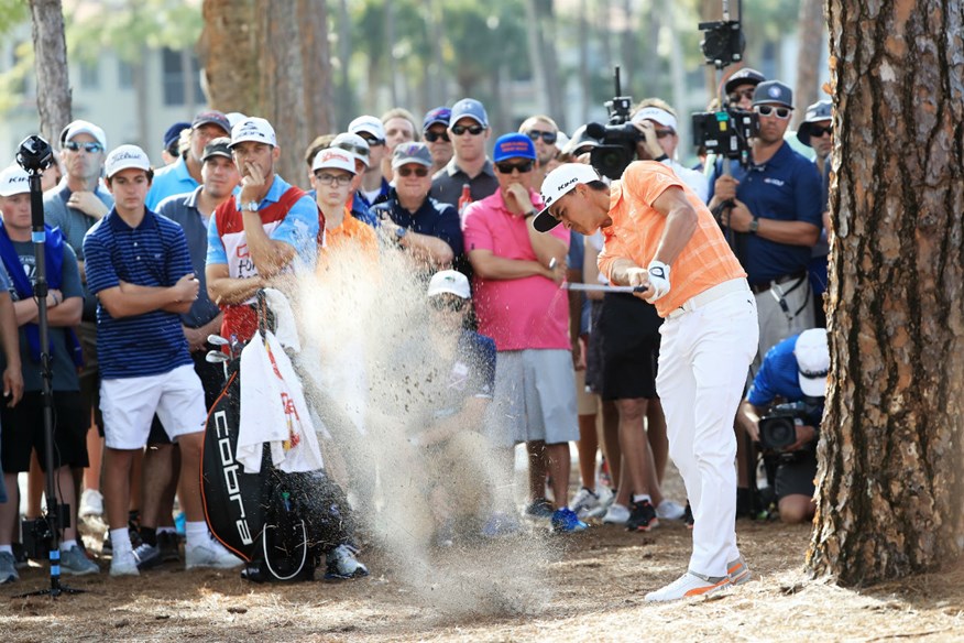 Rickie found his first birdie of the day after driving in to the trees