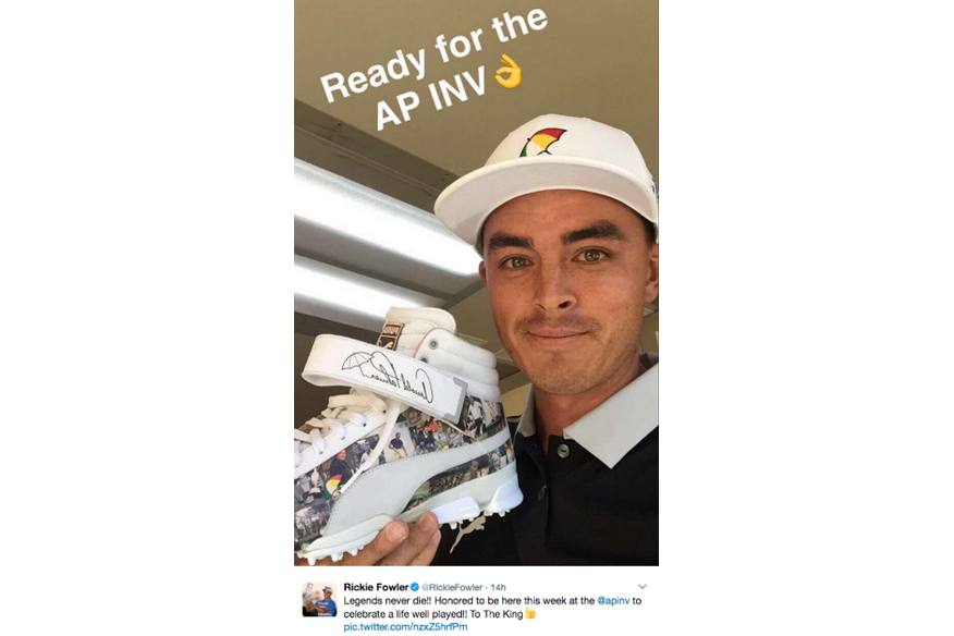 Rickie Fowler holds his Arnold Palmer decorated Hi-Tops