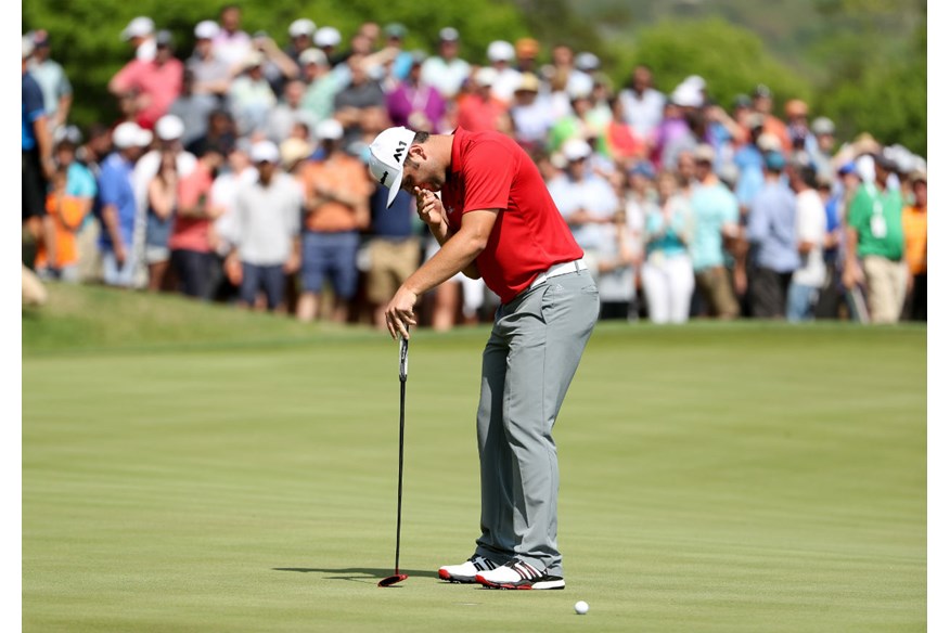 Jon Rahm's mistakes with the putter left him five down after eight