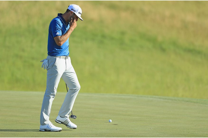 Dustin Johnson misses a putt on 13