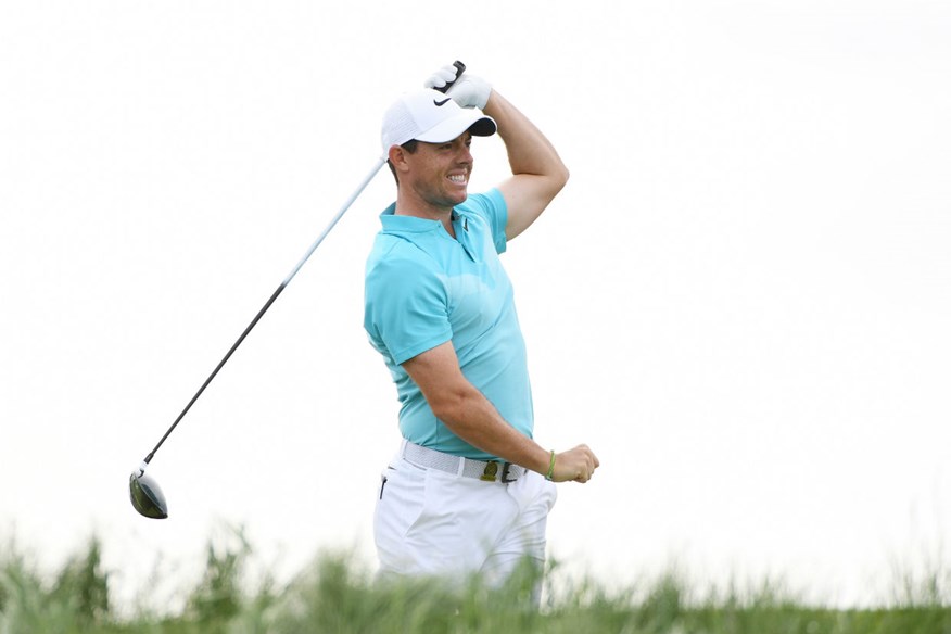 Rory McIlroy grimaces after hitting a wayward tee shot