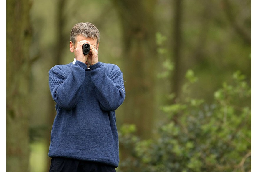 A golf laser rangefinder provides the most accurate yardage to the flag.