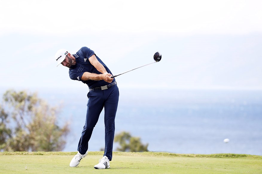 Dustin Johnson smokes his driver.