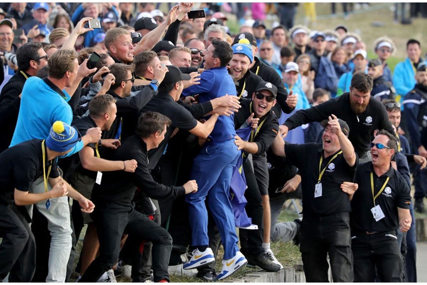 Rory McIlroy celebrates with Ryder Cup fans at Le Golf National in 2018