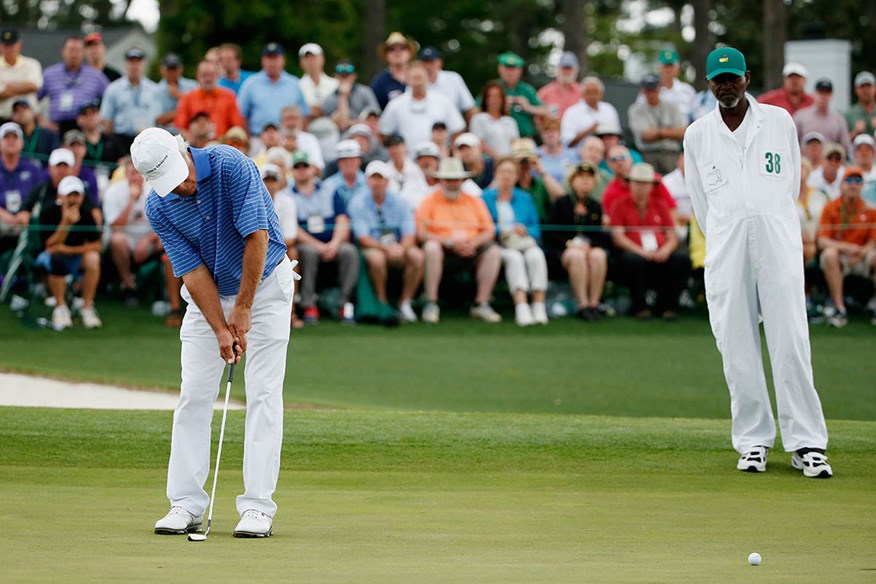 Ben Crenshaw putts at the Masters