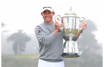 Collin Morikawa lifts the Wanamaker Trophy at TPC Harding Park.