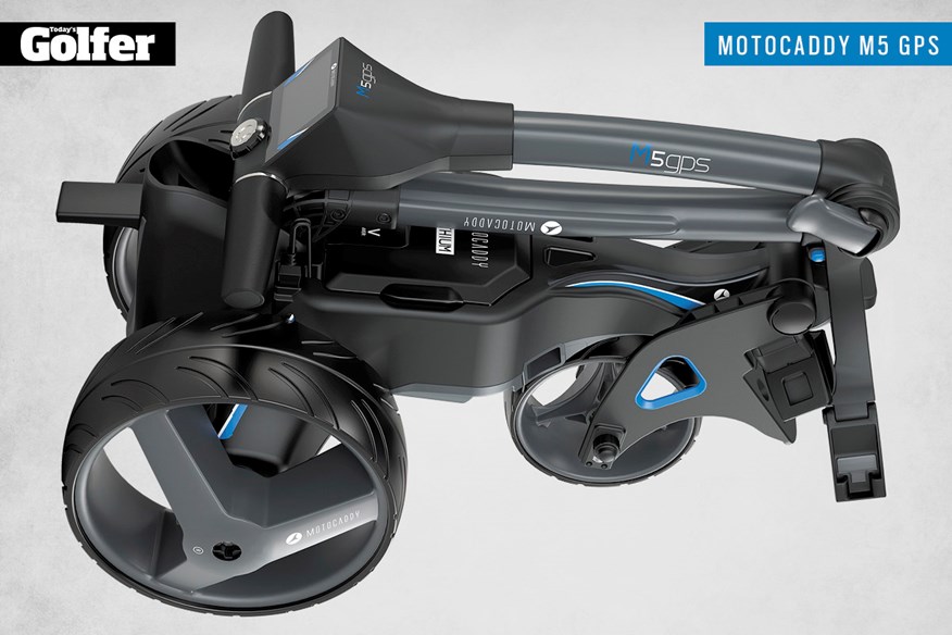 The folded MotoCaddy M5 GPS electric golf trolley.