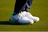 Rory McIlroy wears Nike Golf clothing and shoes.