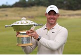 Rory Mcilroy holding the Scottish Open trophy.