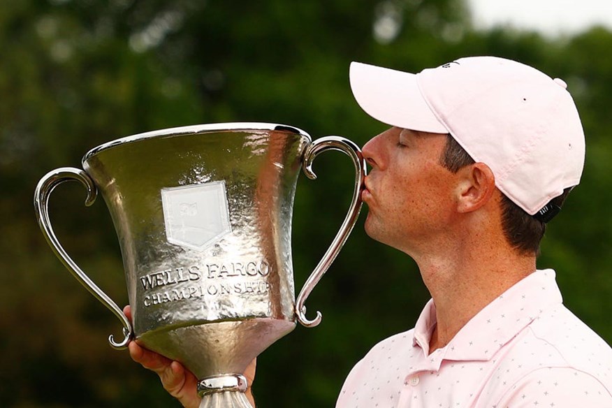 Rory McIlroy lifts the Wells Fargo Championship trophy.