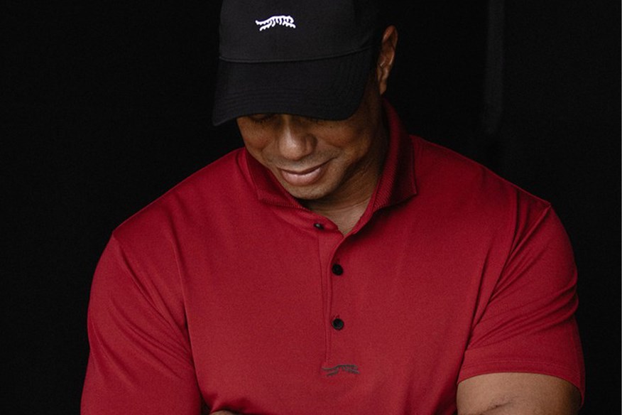 Having split with Nike, Tiger Woods wears his own Sun Day Red clothing line.