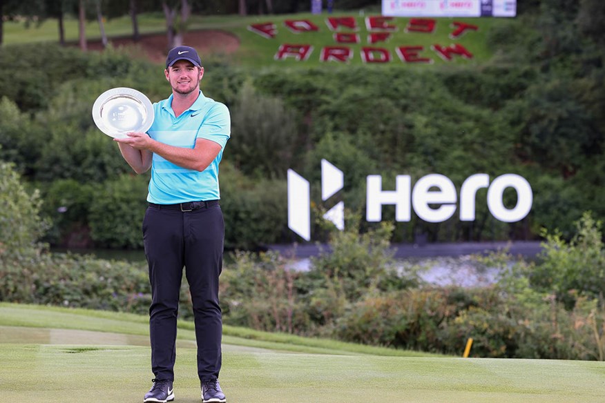 Sam Horsfield with the Hero Open trophy.