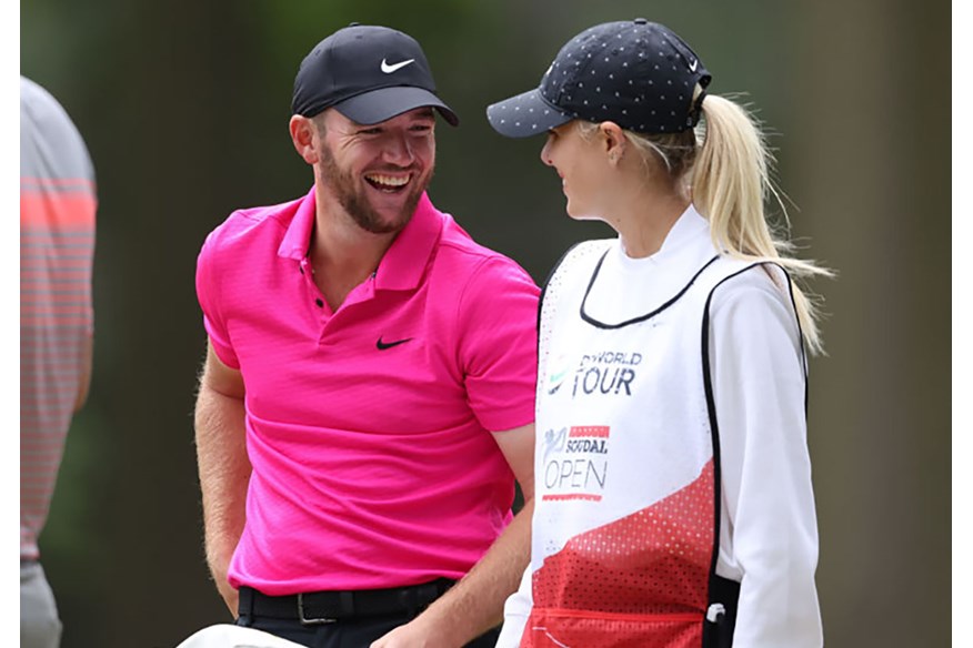 Sam Horsfield, pictured with caddie and girlfriend Isabella Byron, wears Nike Golf apparel and shoes.