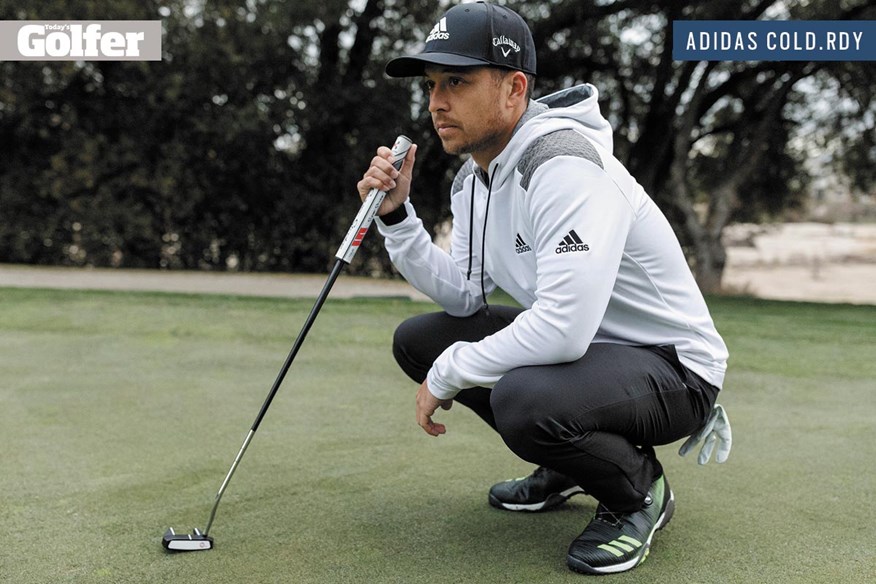 Xander Schauffele in the new adidas Golf COLD.RDY hoodie.