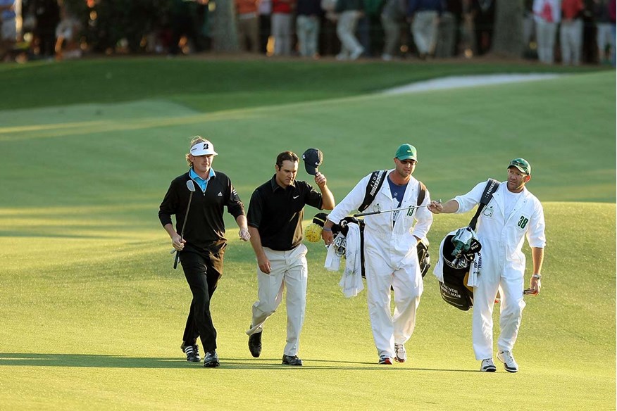 Trevor Immelman acknowledges the Augusta National patrons as he walks up the 18th at the Masters in 2008.