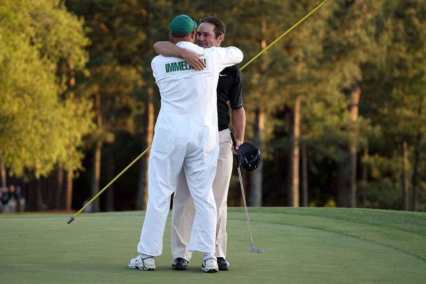 Trevor Immelman celebrates his 2008 Masters victory with his caddie.