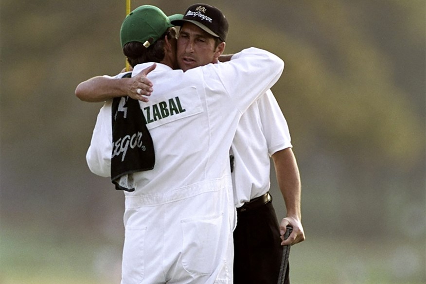 Jose Maria Olazabal celebrates victory with his caddie in 1999.