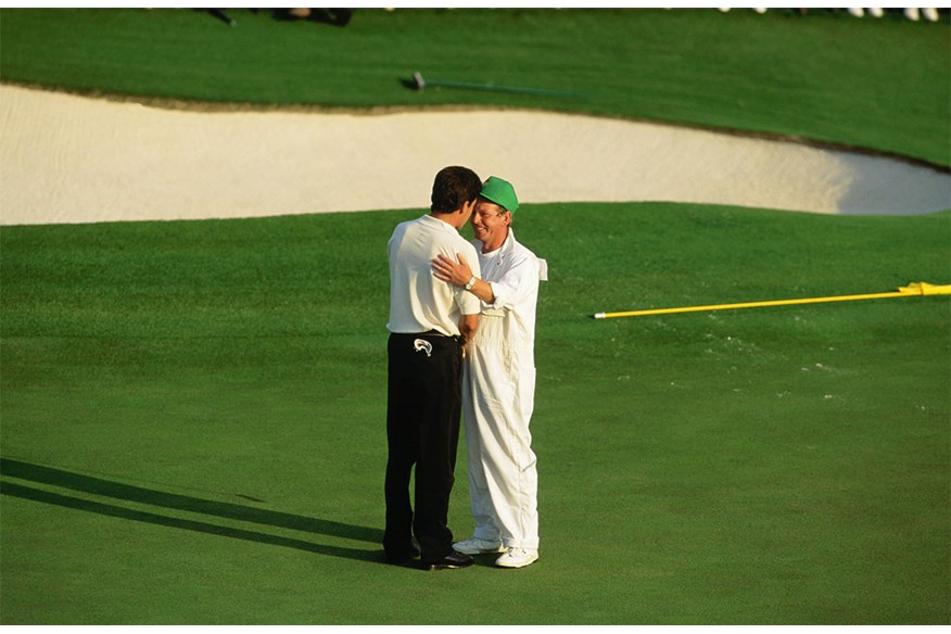 Olazabal shares a moment with his caddie after winning the 1994 Masters.