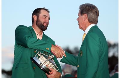 Scottie Scheffler is congratulated by Masters chairman Fred Ridley.