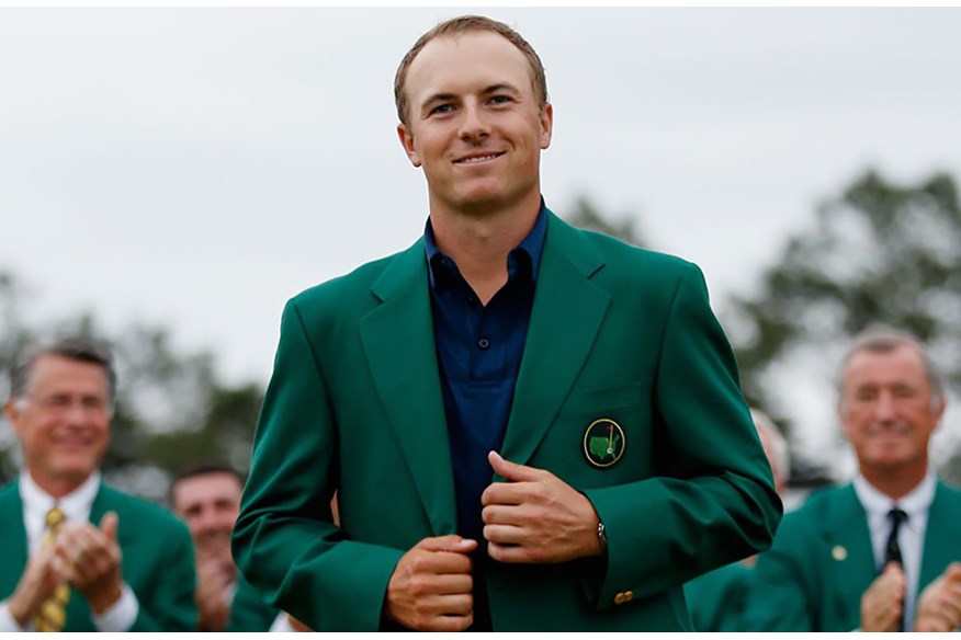 2015 Masters champion Jordan Spieth tries on his Green Jacket.