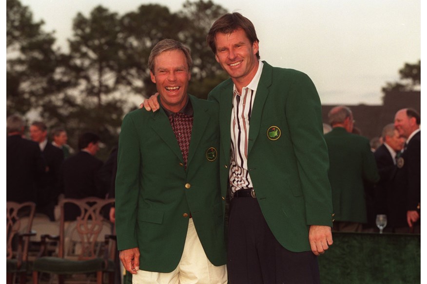 Nick Faldo is all smiles with Ben Crenshaw after receiving the Green Jacket in 1996.