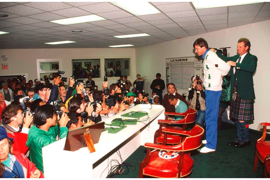 Nick Faldo receives his Green Jacket from Sandy Lyle in 1989.