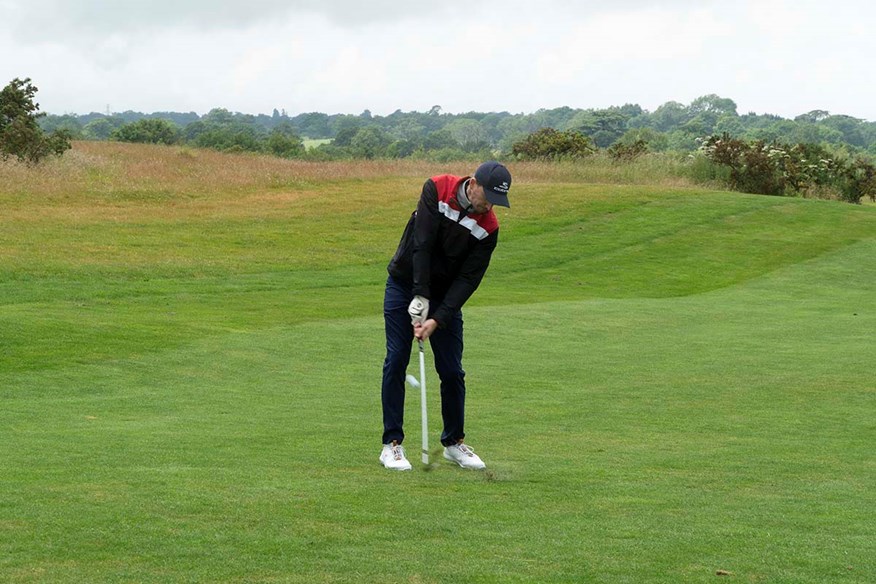 John Robins spends a lot of his spare time on the golf course, to the benefit of his mental health.