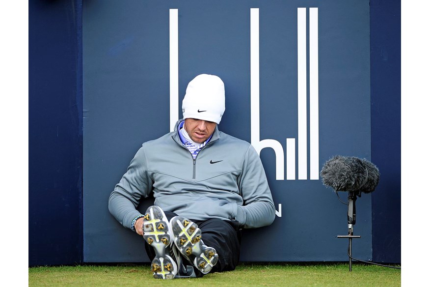 Rory McIlroy looks fed up as he has to wait on a tee at the Dunhill.