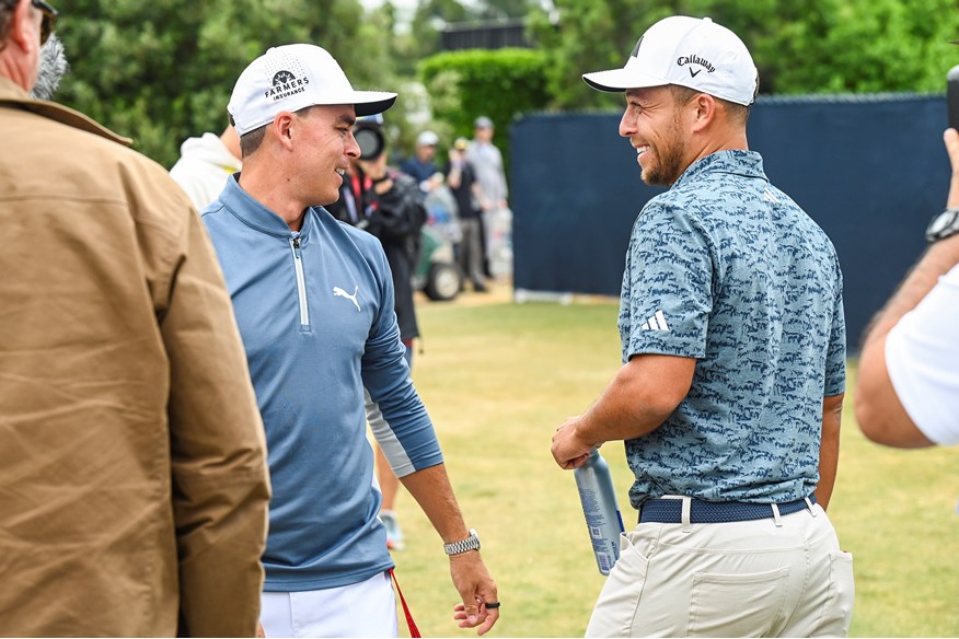 Rickie Fowler and Xander Schauffele chat after carding 62s in the opening round of the 2023 US Open.