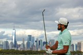 Tony Finau irons