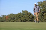 Tony Finau walking round his putt at the Houston Open.