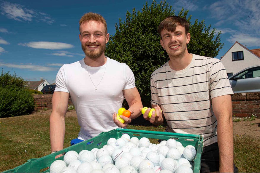 Campbell Mathieson and Andrew Bogle recycle golf balls and sell them for charity.