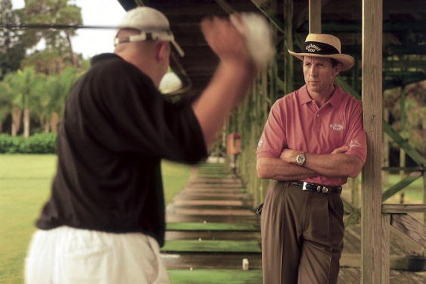 Renowned coach David Leadbetter gives a golf lesson.